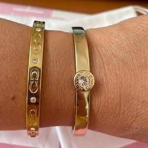 Set of 2 Coach bangles gold toned (costume)